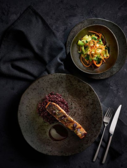 a pair of Rustico Stoneware plates and bowels creating a very artistic looking meal