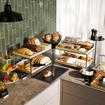 bread and baked goods on a buffet
