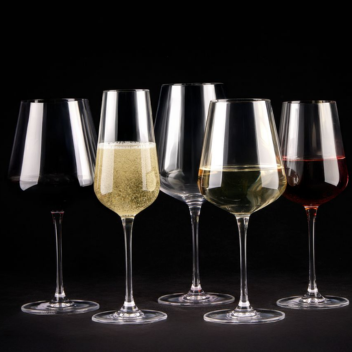 wine glasses filled red, white and sparkling wine