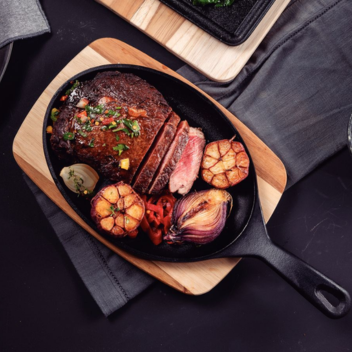 grilled meat and veg in cast iron